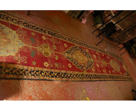 A Kurdish runner 560 x 105cm and a Beluchi rug 170 x 116cm  