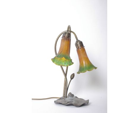 An Art Deco 'Cascade' twin branch table lamp with coloured glass shades and nine Welbrook, four decorated cutlery