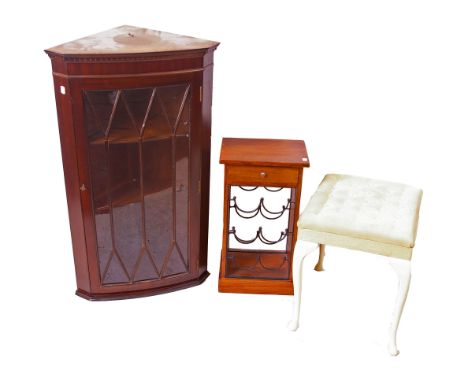 A George III style mahogany hanging corner cabinet, a small wine rack with drawer, a dressing stool, a standard lamp (sold as