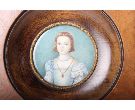 19th Century English School Portrait of a gentleman in a hat Oil on canvas20 x 15cm Together with a pair of miniatures on ivo