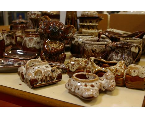 Paignton wares to include novelty boots and egg cups, together with vases, candlesticks and teapots