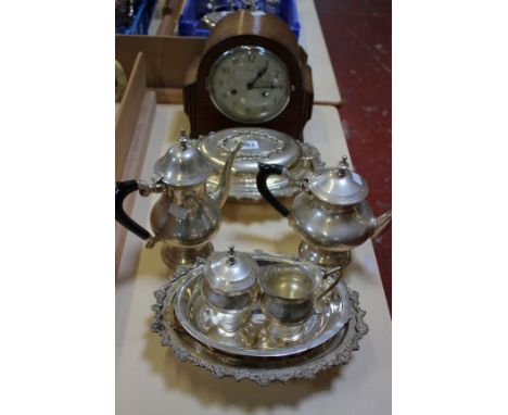 A small quantity of plated items and an oak mantel clock