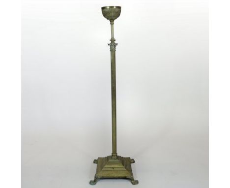 A late Victorian brass telescopic standard lamp, in the form of a corinthian column, on paw feet