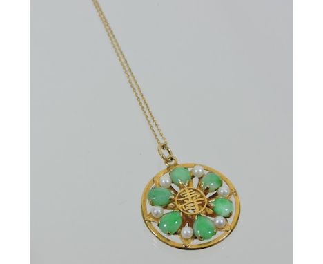 A 14 carat gold jade and pearl pendant, on a fine chain