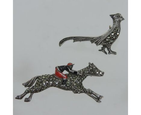 A marcasite and enamel brooch, in the form of a horse and jockey, 4cm long, together with another in the form of a pheasant (