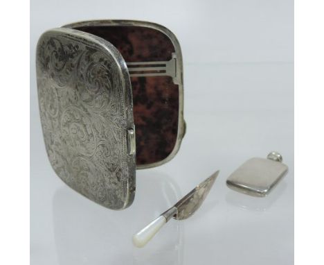 A Victorian silver plated cigarette case, of hinged rectangular shape with a tortoiseshell lined interior, pat no. 216419, 9c