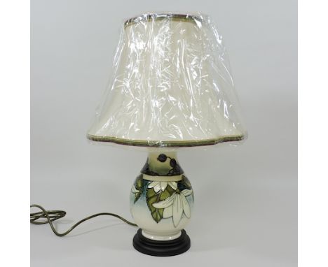 A Moorcroft pottery table lamp and shade, 46cm tall overall