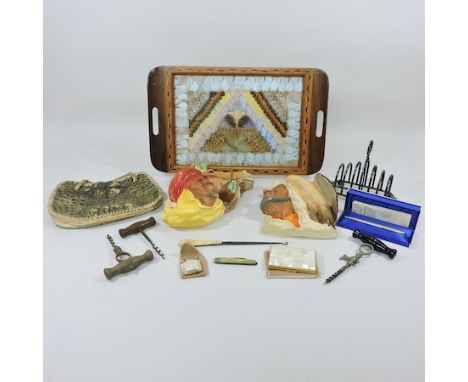 A collection of items to include a Ronson case and lighter, together with a toast rack, a butterfly wing tray and corkscrews