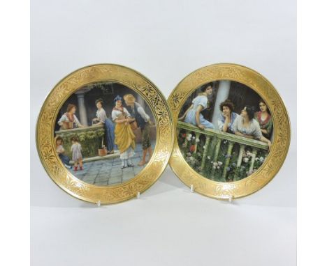 A pair of Bavarian Kronester porcelain cabinet plates, the first decorated with young ladies on a veranda, the other with a c