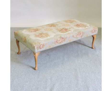 A Queen Anne style tapestry upholstered footstool, 130cm