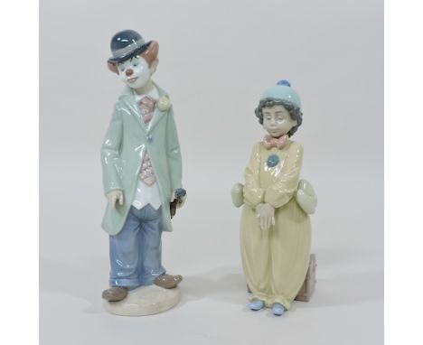 A Lladro figure of a clown, together with another, largest 23cm tall