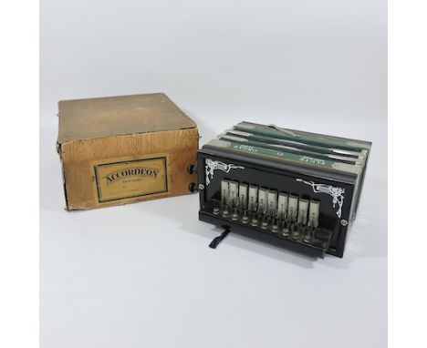 COLLECTED A Flute accordion, boxed