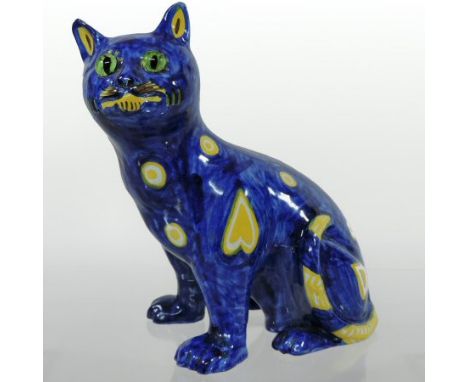 An Art Nouveau Mosanic blue glazed faience model of a seated cat, circa 1900, with glass eyes, inscribed mark to base, 20cm t