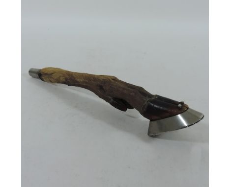 An early 20th century taxidermy snuff box, in the form of a deer foot, with a plated mount, 26cm