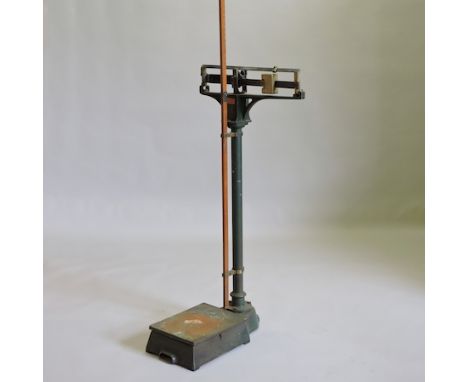 A set of mid 20th century cast iron doctors balance scales, 128cm tall