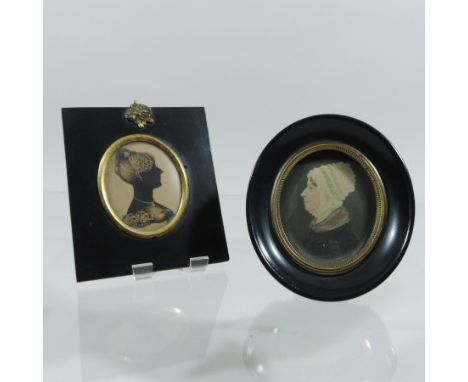 English School, early 19th century, a head and shoulders portrait miniature of a lady in profile, wearing a white hat and bla