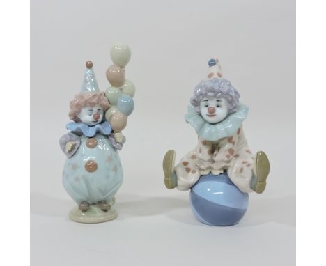 A Lladro figure of a clown, together with another, largest 18cm tall