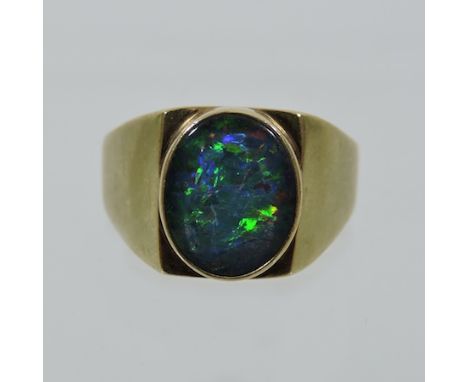 A 9 carat gold opal ring