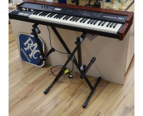A Hammond organ model XK1 with stand