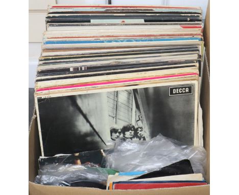 A box of rock and pop LPs and singles to include The Beatles and The Rolling Stones