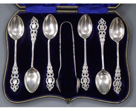 A cased set of six Edwardian silver teaspoons and pair of sugar tongs.