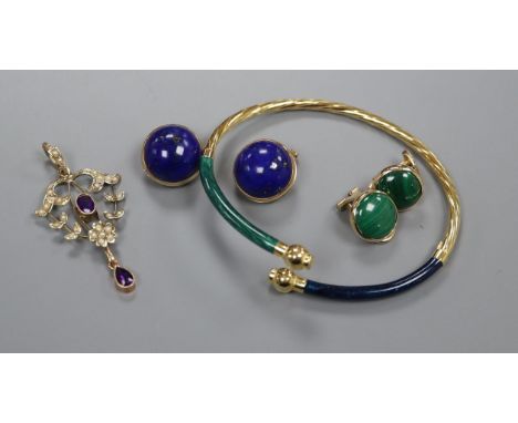 An Edwardian yellow metal, amethyst and seed pearl pendant, two pairs of 9ct earclips and a 375 bangle.