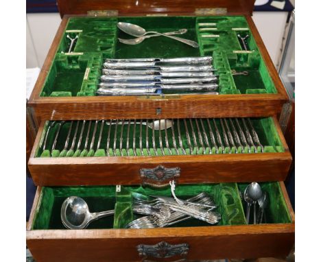 A part canteen of Queen's pattern plated flatware in oak two-drawer canteen, etc. comprising 12 dinner forks, 12 soup spoons,