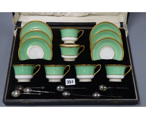 A Royal Worcester coffee set (six cups and saucers)