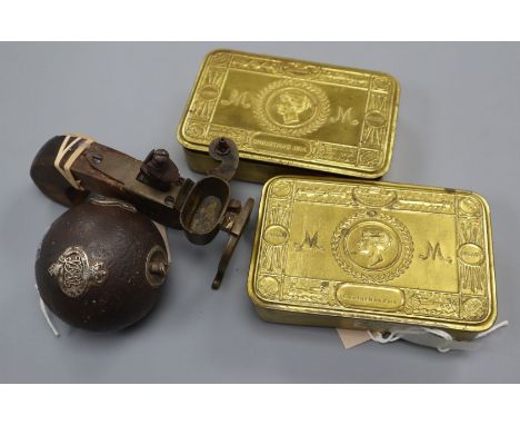 A WWI grenade lighter and two Queen Mary Christmas boxes
