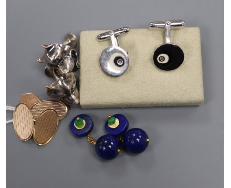Four pairs of cufflinks: 9ct gold, lapis lazuli and two silver pairs including dog's head with enamel.