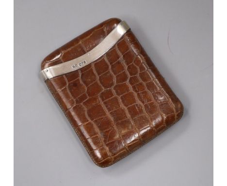 An Edwardian silver mounted crocodile skin cigar case, Grey &amp; Co, Chester, 1909, 11.9cm.