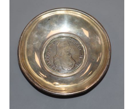 A silver coin dish