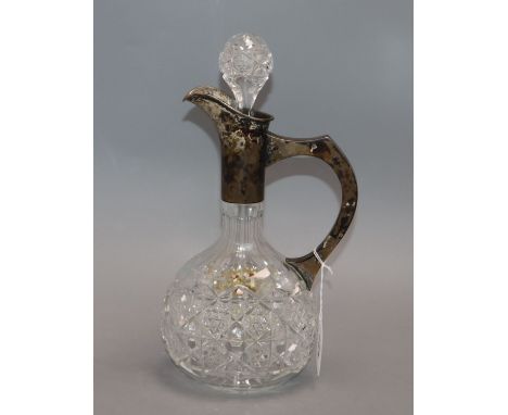 A silver mounted cut glass claret jug height 29cm