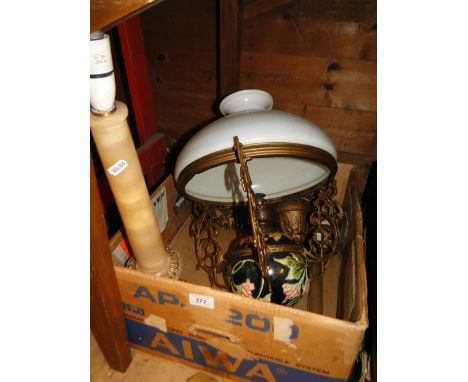 An alabaster table lamp & a ceiling light fitting