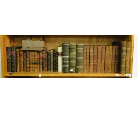 A shelf of leatherbound books including Gibbon's Rome