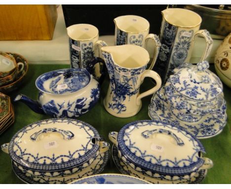A pair of sauce tureens and covers on stands, a Minton teapot, sauce tureen, etc.