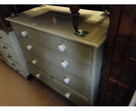 A Victorian painted pine 5-drawer chest with ceramic handles.