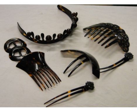 Vintage hair combs including tortoiseshell.