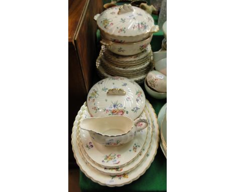 A Clarice Cliff design Old Bristol porcelain dinner service with tureens and meat plates.