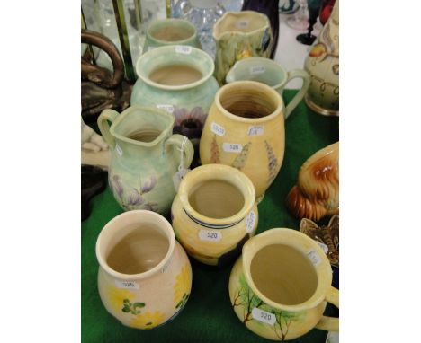 Various Radford jugs and vases.
