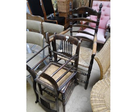 Pair of Victorian spindle back cane seated hall chairs and a ladder back elbow chair.