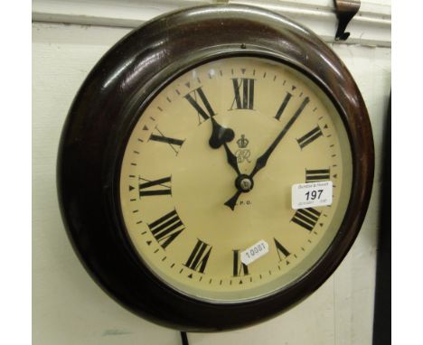 A Vintage G P O electric wall clock.