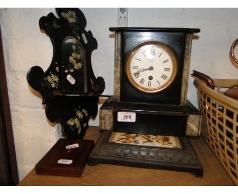 A tiled top stand, a Benson's marble cased mantel clock, a mirrored shelf bracket and a small box.