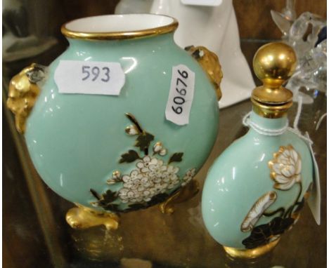 A miniature Coalport flask with water lily decoration and matching vase.