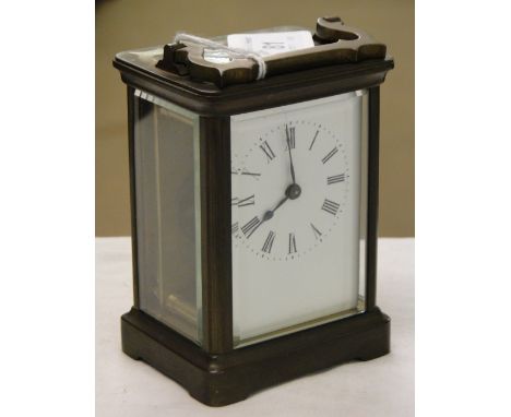 A French brass cased carriage clock.