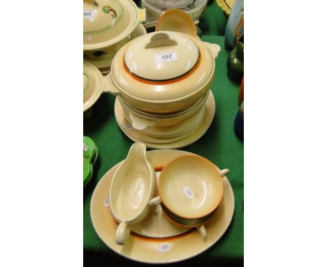 A Clarice Cliff dinner service with banded decoration, with 2 tureens.