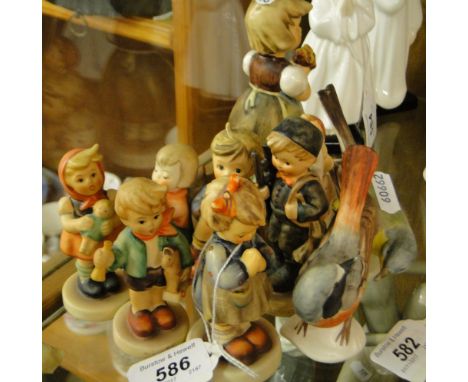 Various Hummel figures and 2 Goebel's birds.