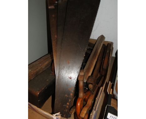 Woodworking tools, saws and planes.