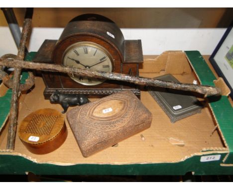 An anchor, mantel clock, carved wood box, etc.