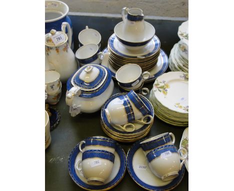 Booth's blue and gold patterned teaset with teapot.